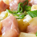 Scalloped Potatoes and Ham in the Crock Pot. Photo Credit Practically Homemade.