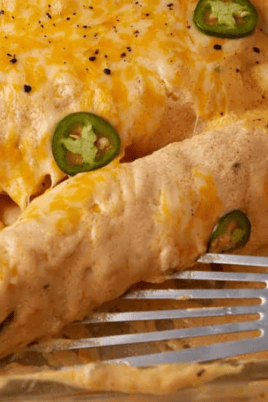 Shrimp Enchiladas With Sour Cream Cheese Sauce. Photo credit Butter and Baggage.