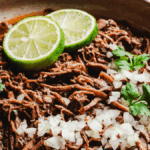 Easy Slow Cooker Birria De Res. Photo credit Pinch and Swirl.