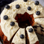 Lemon Blueberry Bundt Cake With Cream Cheese Frosting. Photo credit Butter and Baggage.