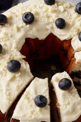 Lemon Blueberry Bundt Cake With Cream Cheese Frosting. Photo credit Butter and Baggage.