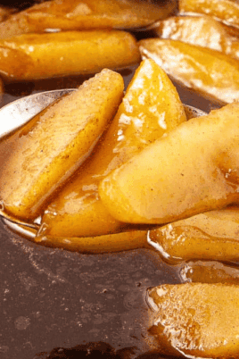 Sliced apples cooked in a cinnamon and brown sugar sauce