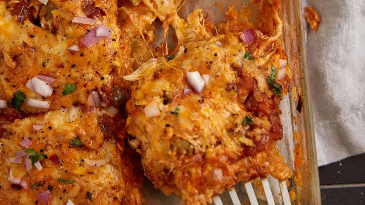 Chicken Enchilada Layered Casserole (Easy Homemade Sauce). Photo credit Butter and Baggage.