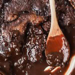 Chocolate Cobbler with a wooden spoon