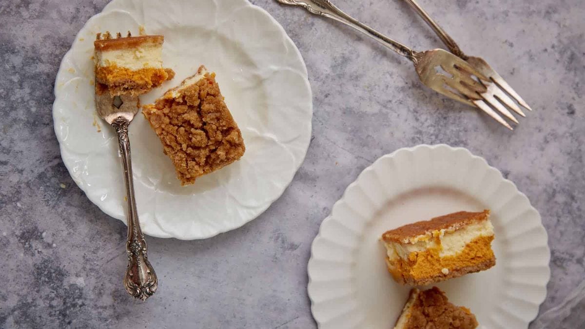 Pumpkin Cheesecake Bars With Two Layers Of Cheesecake. Photo credit Butter and Baggage.