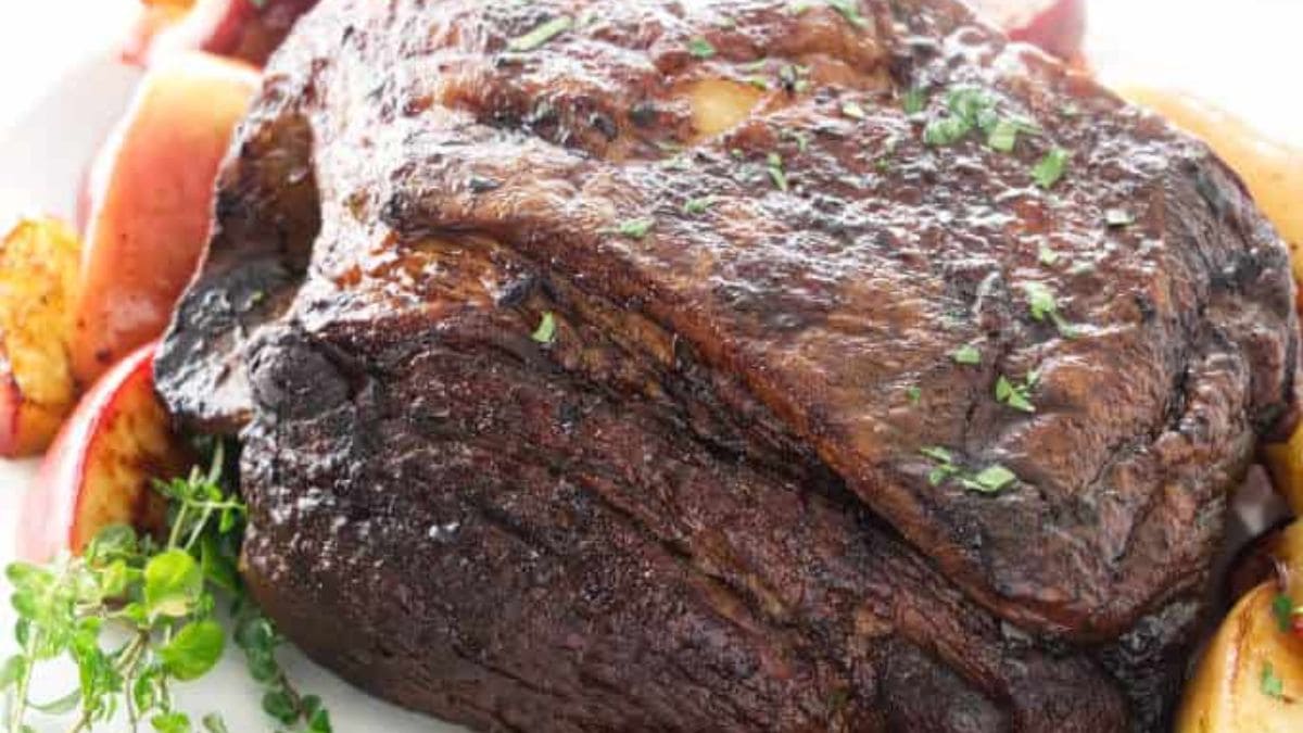 Cider Braised Pork Shoulder With Apples. Photo credit Savor the Best.