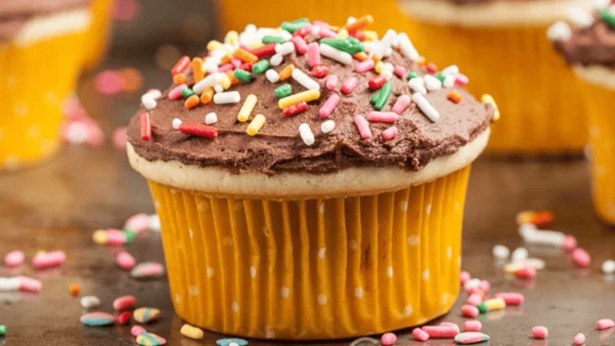 Yellow Cupcakes with Chocolate Ganache Frosting. Photo credit Chew Out Loud.