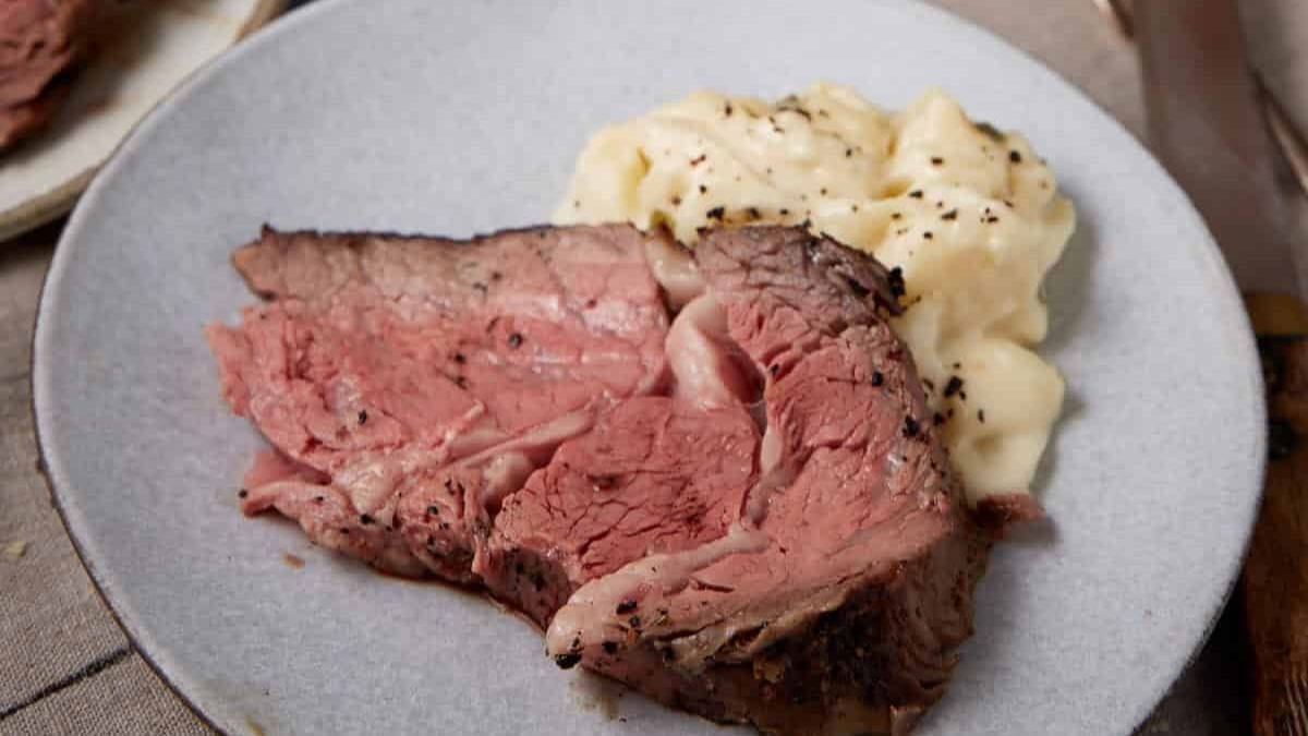 Oven Roasted Standing Rib Roast With Garlic Herb Butter. Photo credit Butter and Baggage.