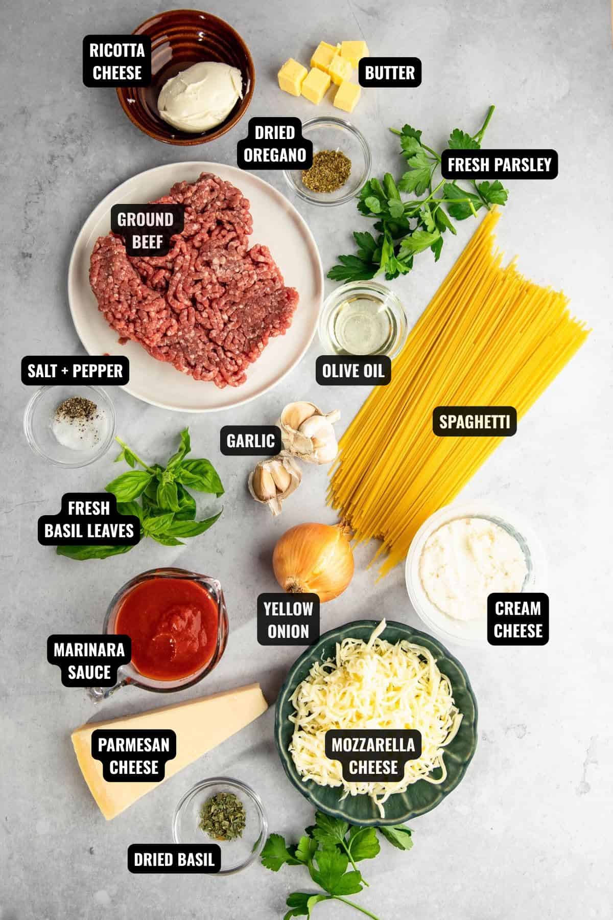 baked spaghetti casserole ingredients on a tablescape