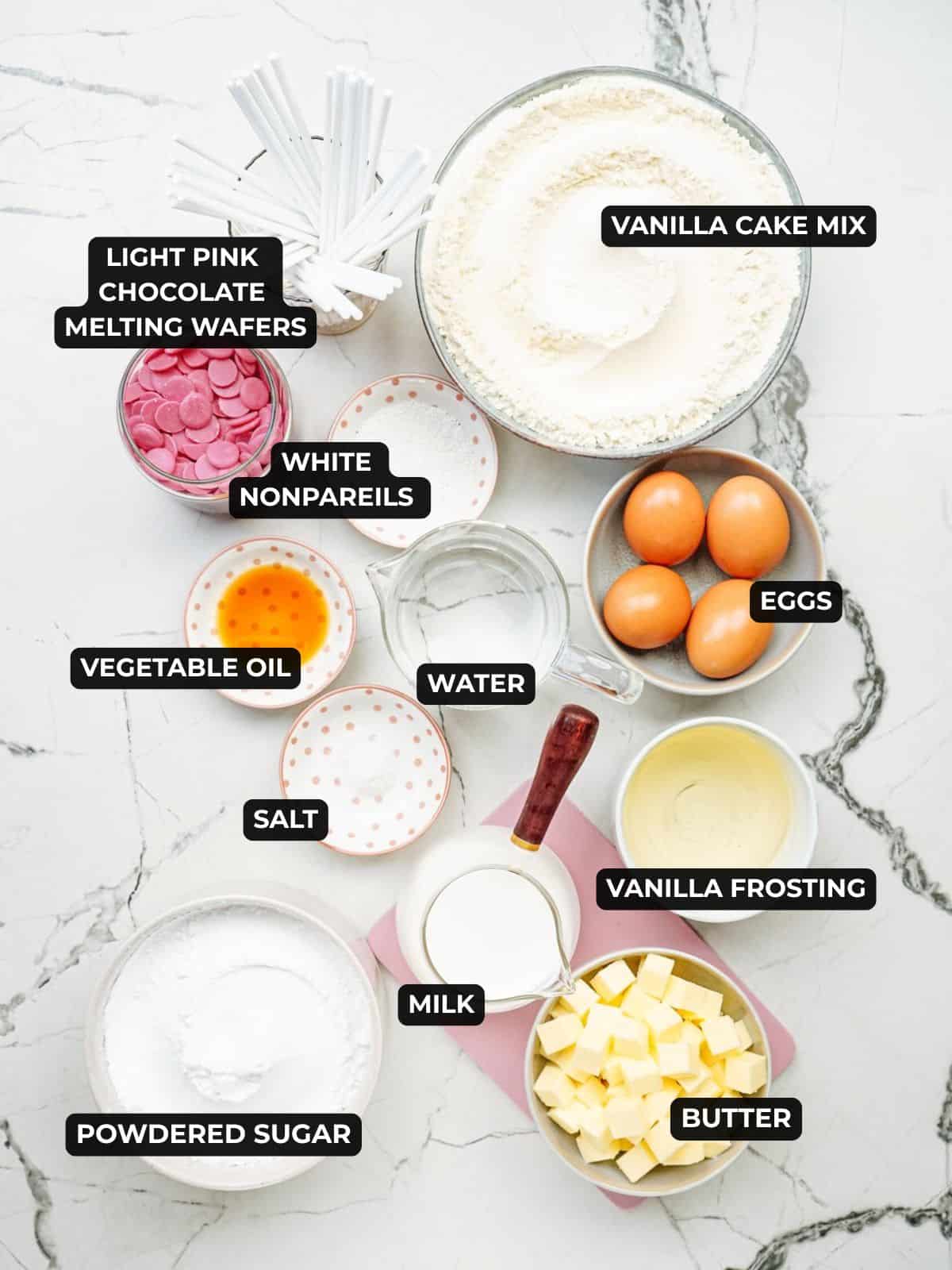 ingredients for starbucks cake pop recipe including vanilla cake mix, eggs, vanilla frosting, and butter