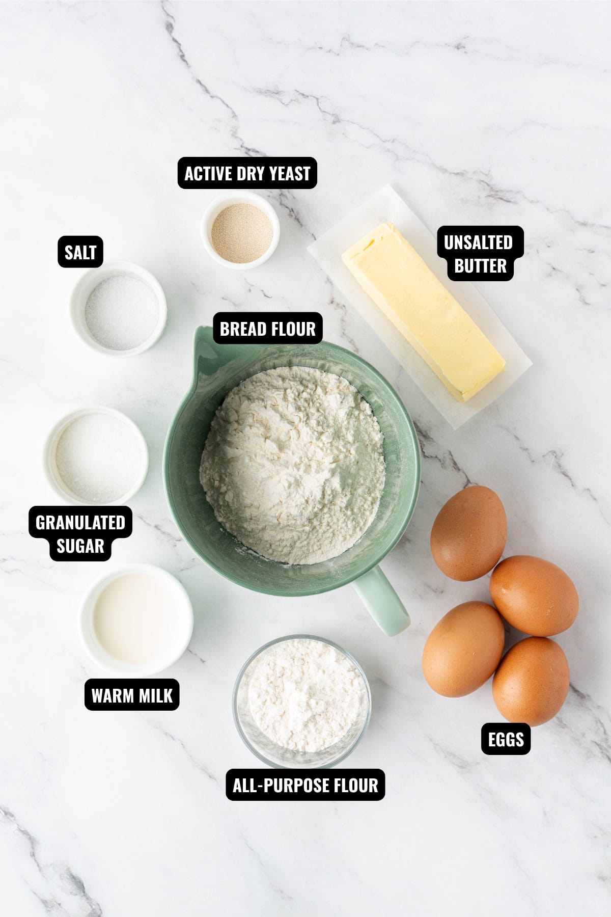 ingredients for donut holes recipe including bread flour, all-purpose flour, sugar, milk, eggs, butter, yeast, and salt