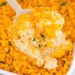 Funeral potatoes topped with crispy cornflake crust and creamy cheesy potato filling