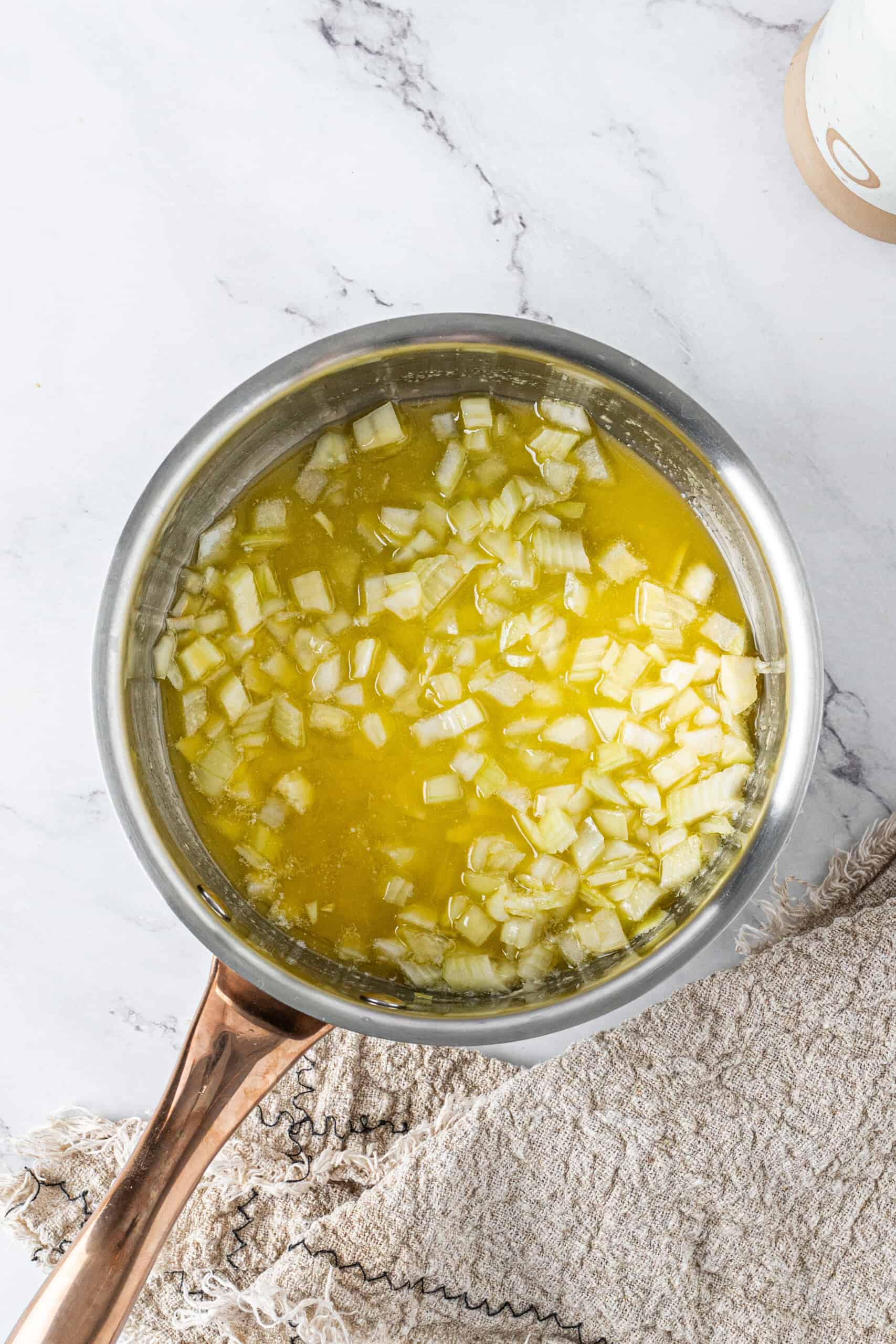Butter, and diced onions in a saucepan