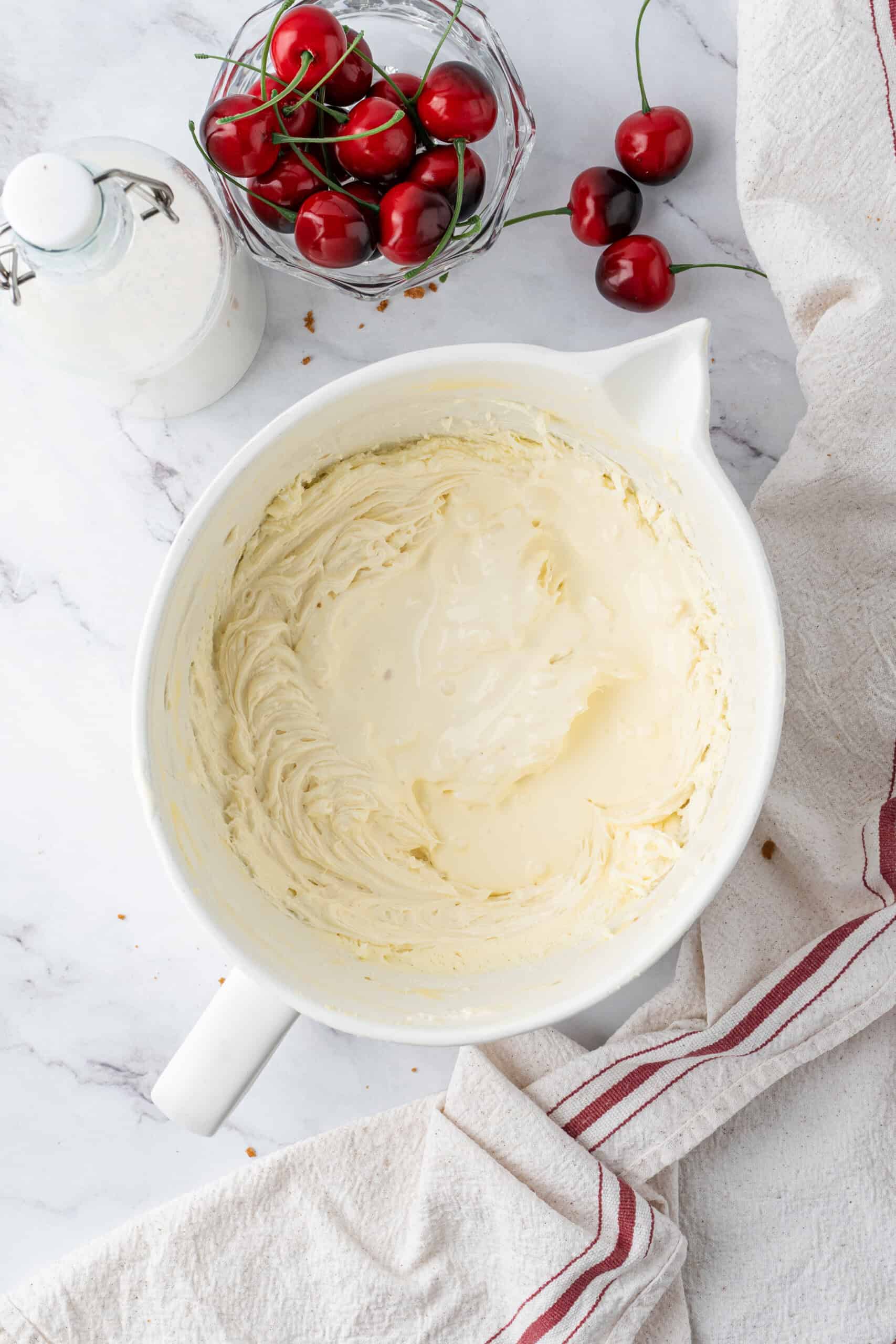 Heavy cream added to the cream cheese mixture