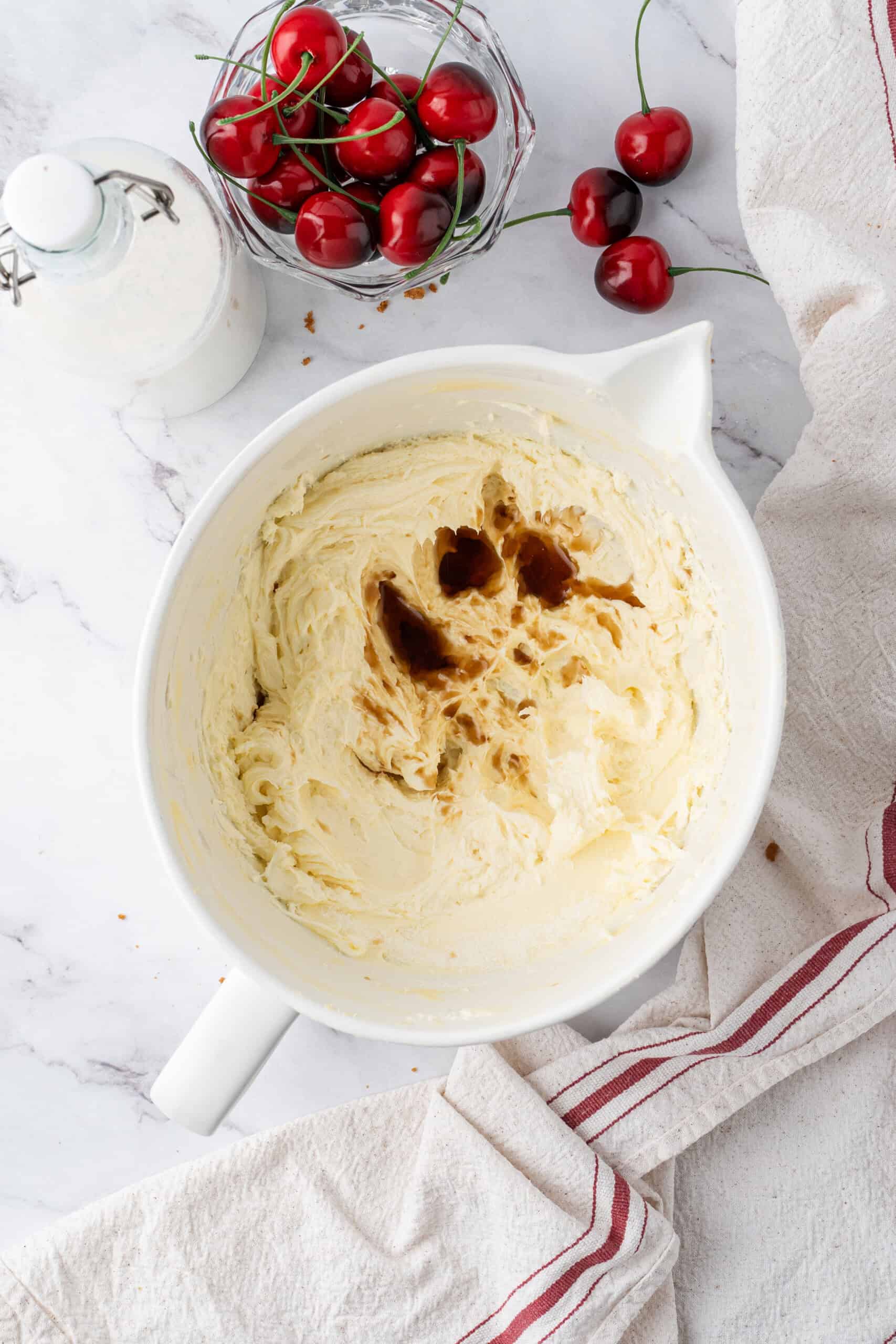 Vanilla extract added to the beaten cream cheese mixture