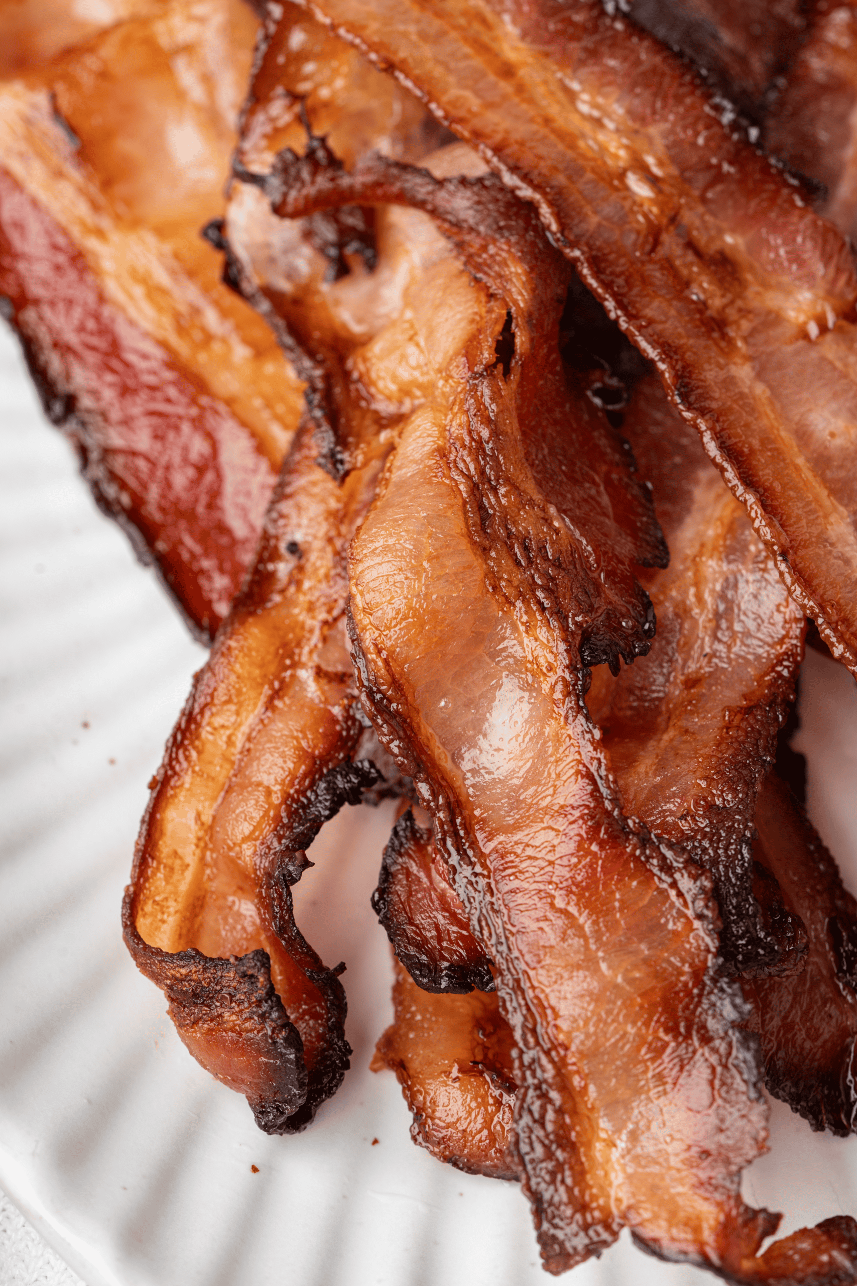 Close-up of crispy oven-baked bacon strips.