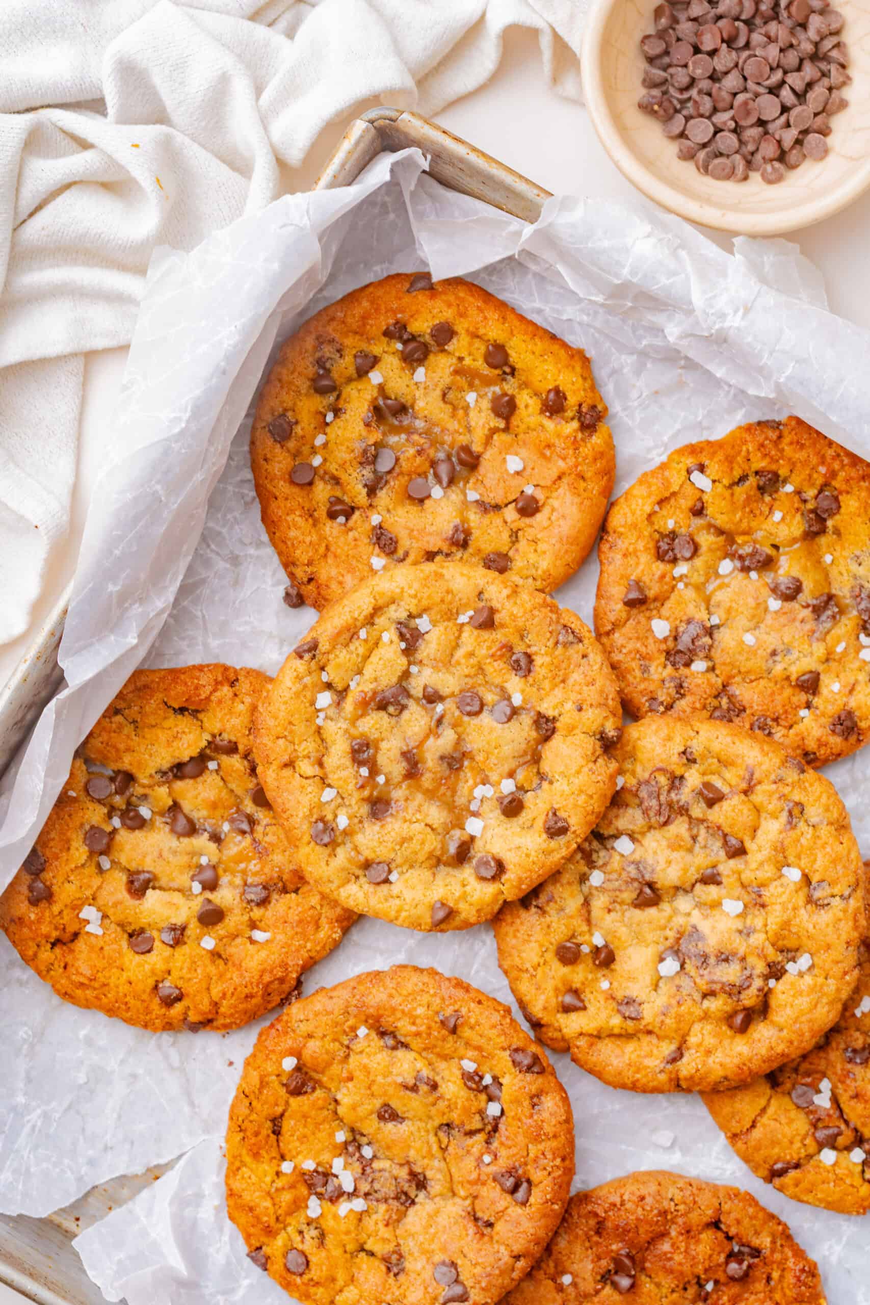 Maple chocolate chip cookies topped with flaky sea salt.