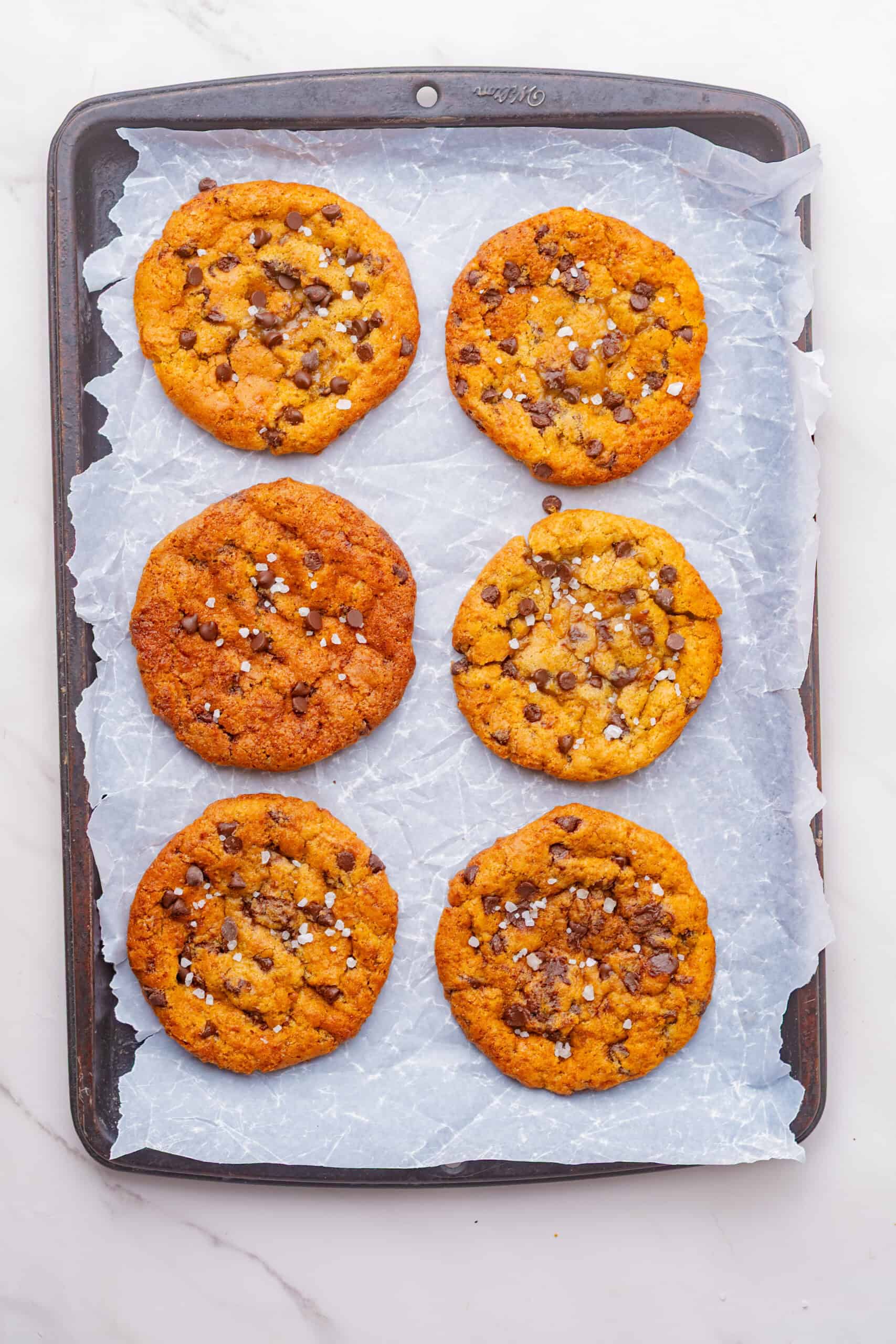 Baked maple cookies topped with flaky sea salt.