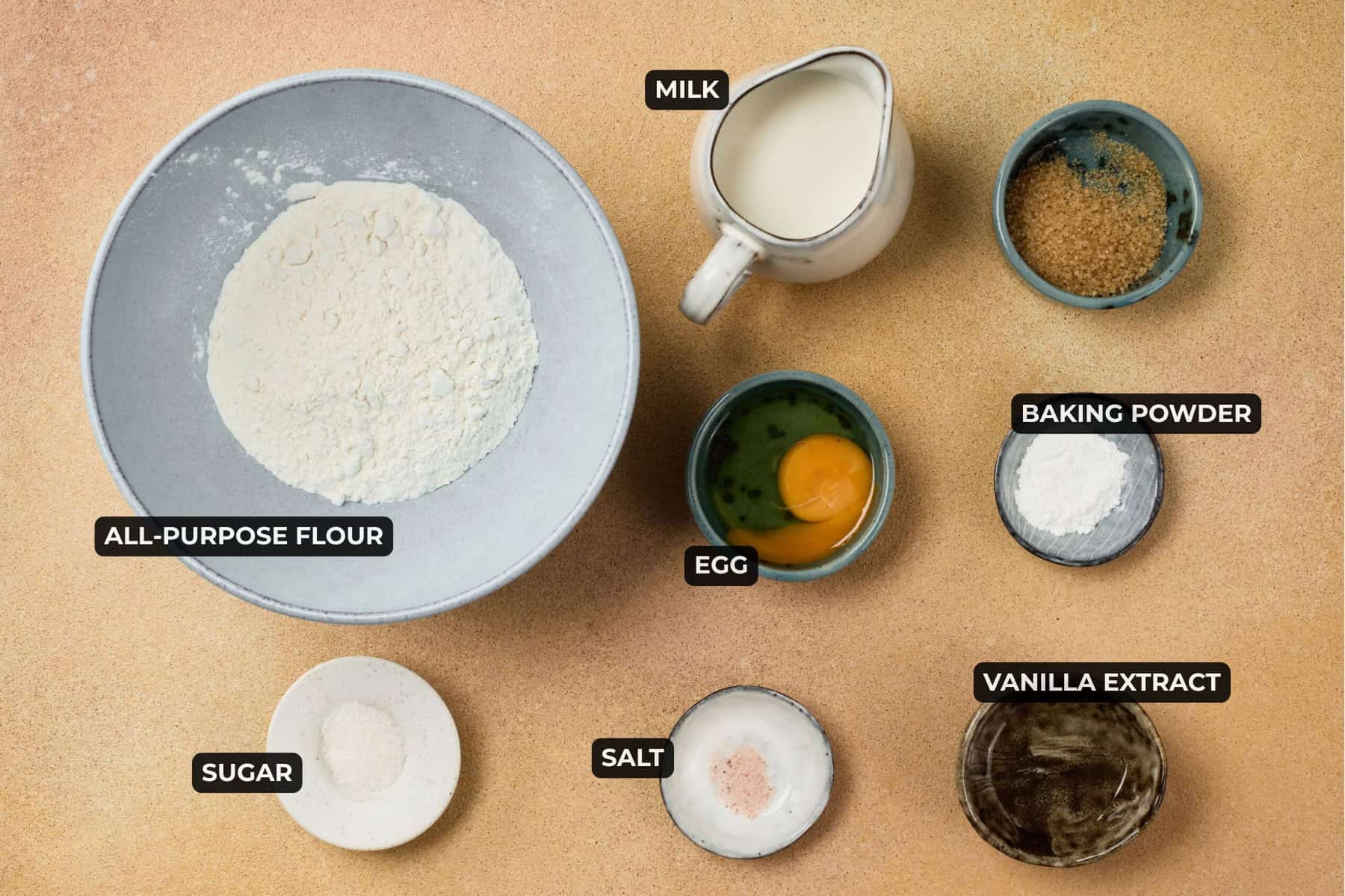 ingredients for pancake tacos including flour, milk, egg, sugar, salt, vanilla extract, and baking powder