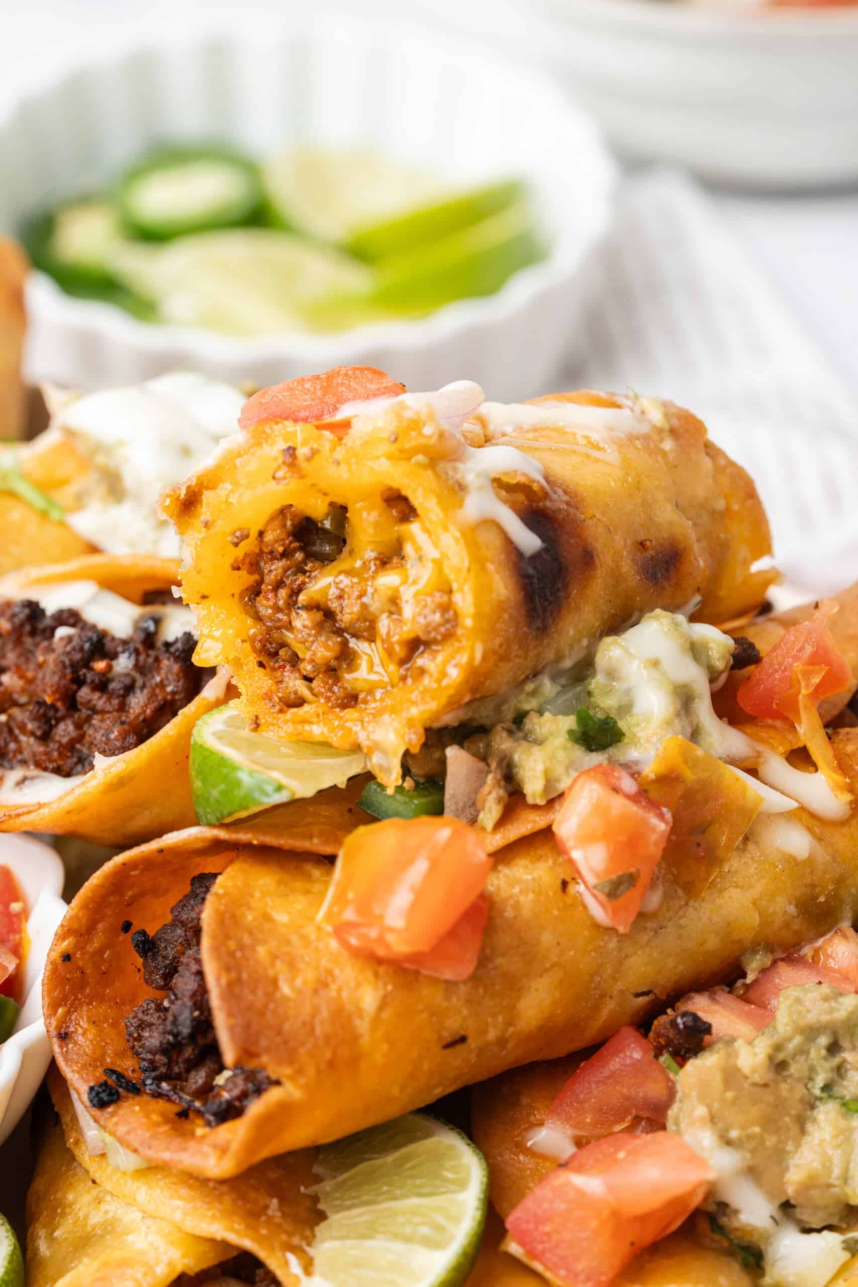 Crispy taquitos filled with seasoned ground beef and melted cheese.