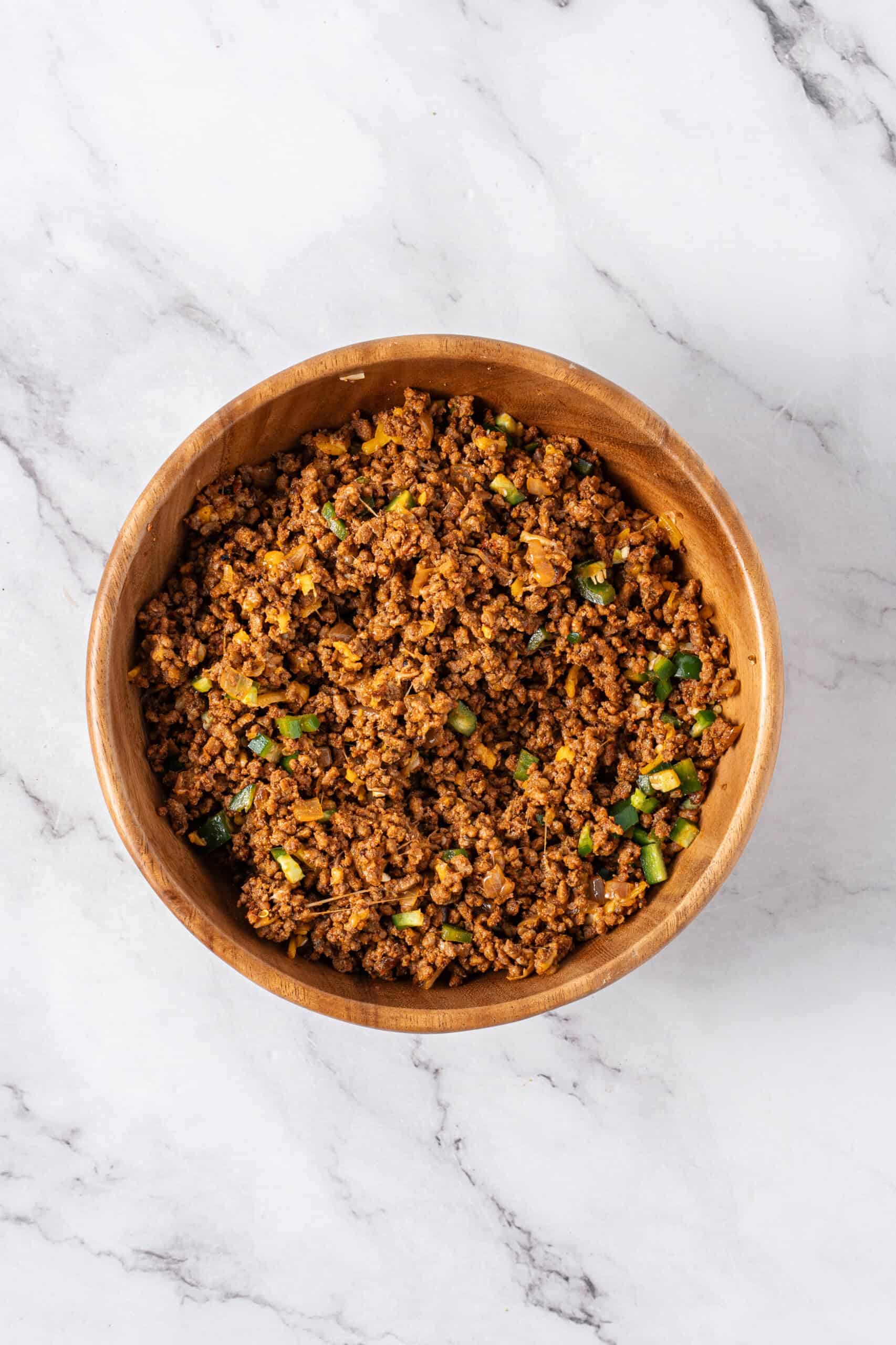 Seasoned ground beef mixed with melted cheese and diced jalapeños.