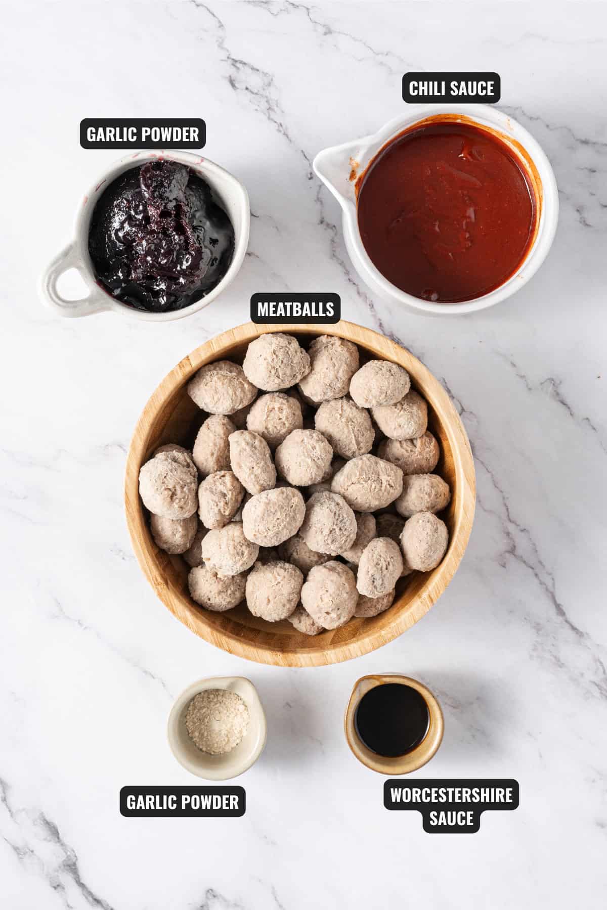 ingredients for grape jelly meatballs recipe including garlic powder, chili sauce, meatballs, garlic powder, and worcestershire sauce