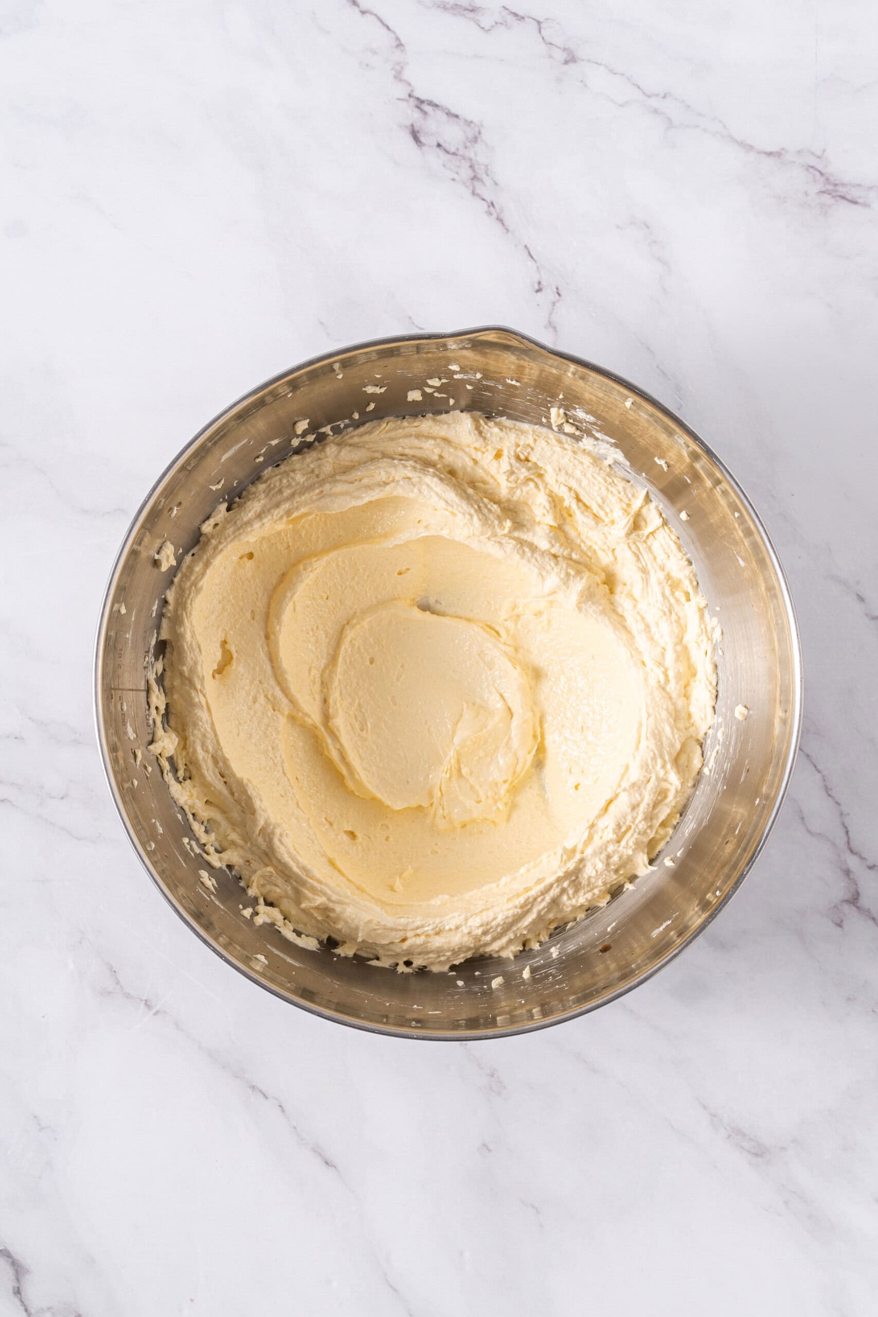 cookie mixture after egg yolk and vanilla extract are fully combined.